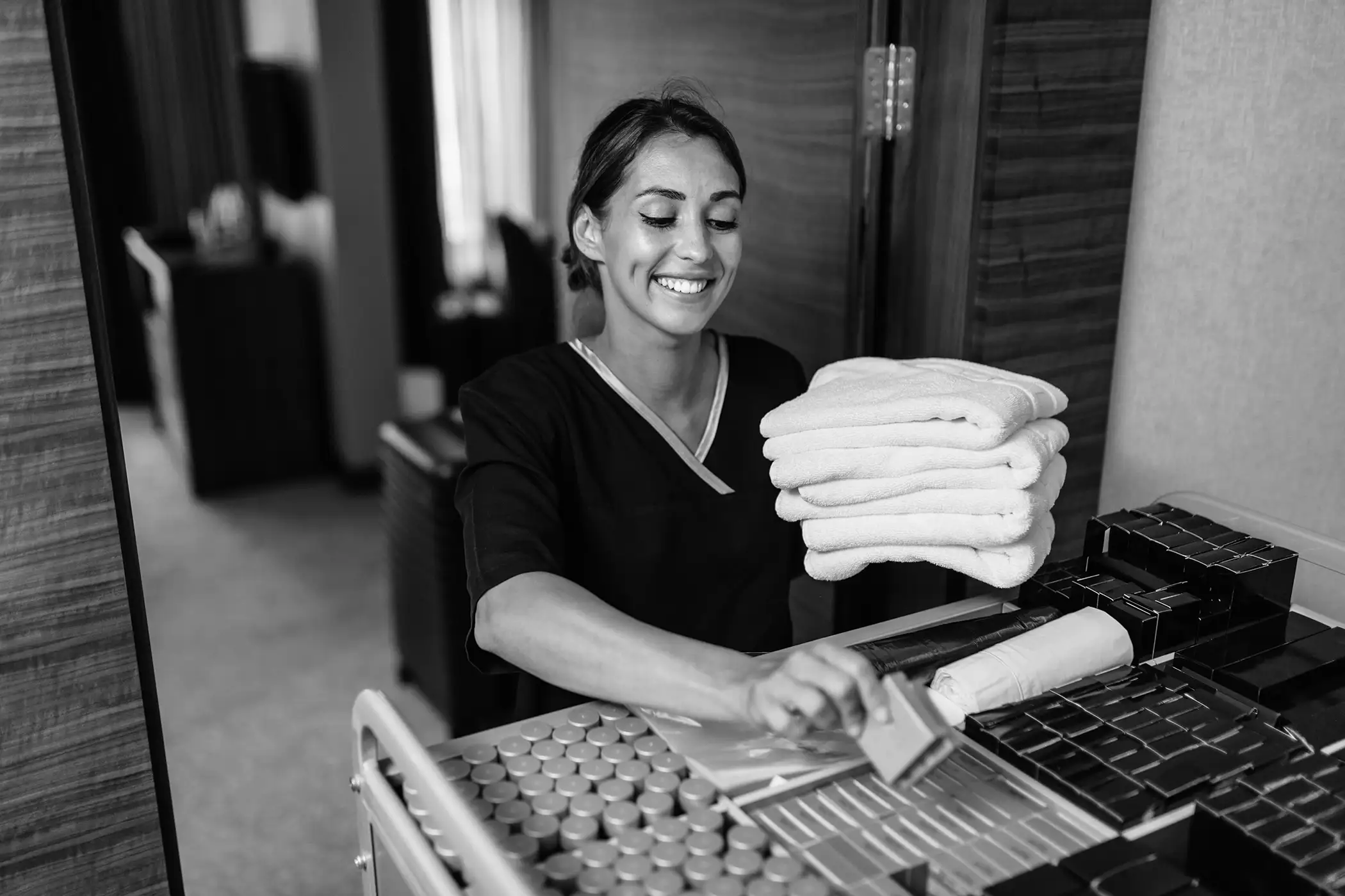 a woman cleaning a hotel in dubai